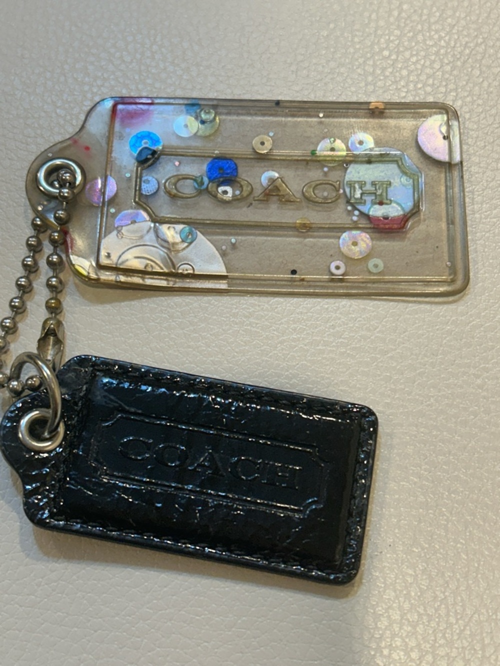 Coach Iridescent Poppy Sequin Clear Tag with Black Leather Logo Tag